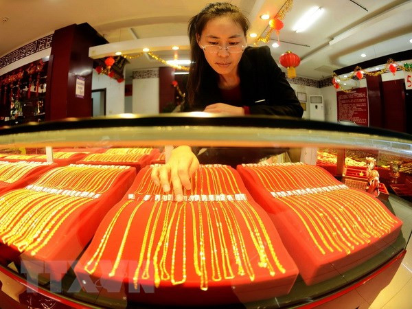 Giá vàng thế giới lên mức đỉnh, vượt ngưỡng 1.200 USD mỗi ounce ảnh 1