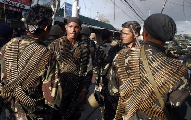 Quân đội Philippines giao tranh ác liệt với nhóm Hồi giáo Abu Sayyaf ảnh 1