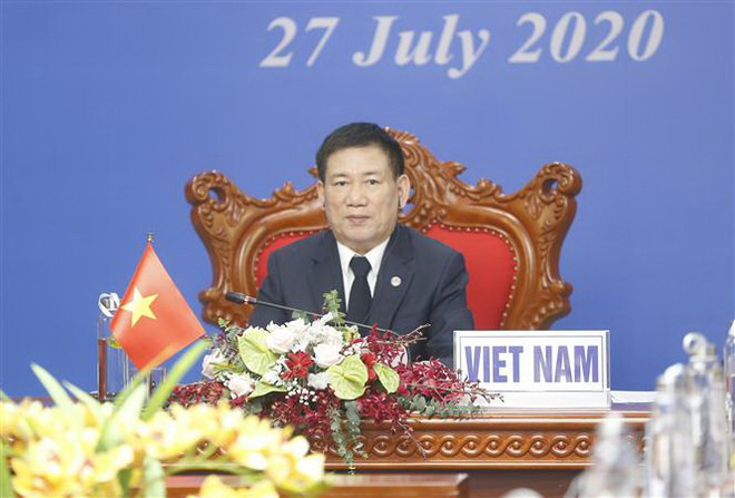 Chủ tịch ASOSAI, Tổng Kiểm toán nhà nước Việt Nam Hồ Đức Phớc phát biểu. (Ảnh: Doãn Tấn/TTXVN) Chia sẻ phương án hỗ trợ người dân, doanh nghiệp ứng phó với COVID-19 ảnh 1
