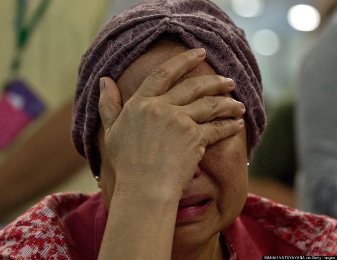 [Photo] Hiện trường vụ máy bay Malaysia MH17 rơi ở Ukraine ảnh 18