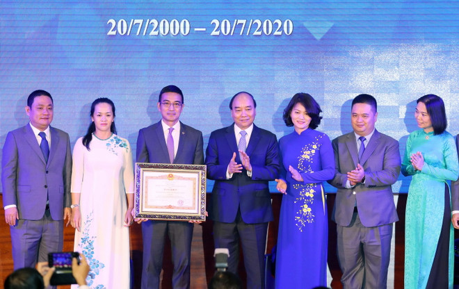 Thủ tướng đánh cồng kỷ niệm 20 năm hoạt động thị trường chứng khoán ảnh 1