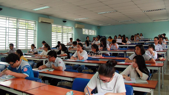 Thí sinh chuẩn bị thi đánh giá năng lực tại Đại học học Quốc gia Thành phố Hồ Chí Minh năm 2019. (Ảnh: Thu Hoài/TTXVN) Đại học Quốc gia TP.HCM lùi thời gian tổ chức thi đánh giá năng lực ảnh 1