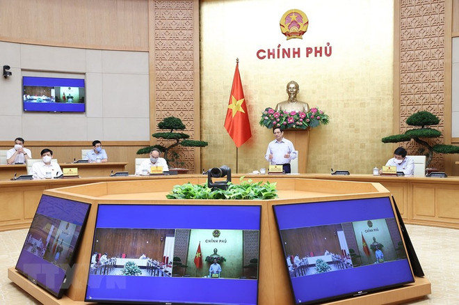 Thủ tướng Phạm Minh Chính phát biểu tại cuộc họp với các nhà sản xuất vaccine phòng COVID-19. (Ảnh: Dương Giang/TTXVN) Kết luận của Thủ tướng về nghiên cứu, sản xuất vaccine phòng COVID-19 ảnh 1
