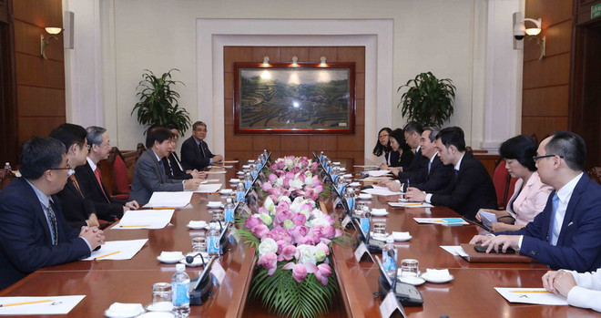 Đoàn Đảng Hành động nhân dân Singapore cầm quyền thăm Việt Nam ảnh 1