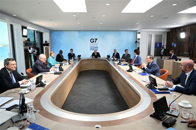 Các đại biểu tham dự Hội nghị thượng đỉnh G7 ở Cornwall (Anh) ngày 12/6/2021. (Ảnh: AFP/TTXVN) Bước tiến quan trọng hướng đến một hiệp định thuế toàn cầu ảnh 1