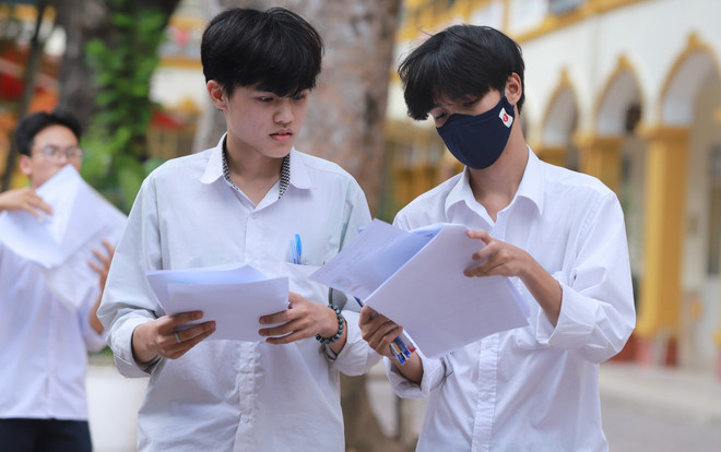 Thí sinh dự thi tốt nghiệp Trung học Phổ thông năm 2023. (Ảnh: Hoài Nam/Vietnam+) Tuyển sinh đại học ở TP Hồ Chí Minh: Điểm chuẩn nhiều ngành tăng vọt ảnh 2