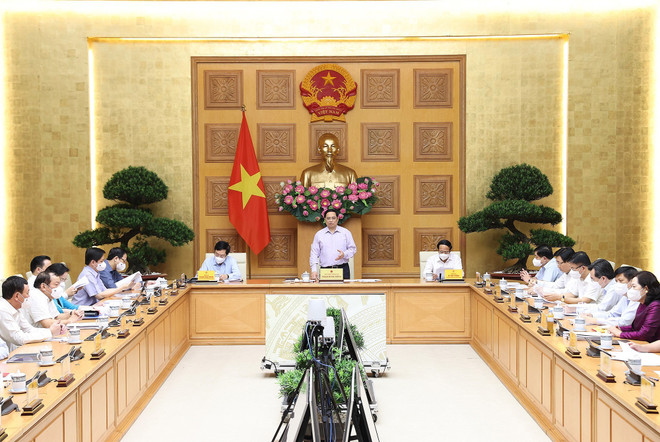 Thủ tướng Phạm Minh Chính chủ trì hội nghị. (Ảnh: Dương Giang/TTXVN) Thủ tướng: Đẩy nhanh tiến độ, chống tiêu cực trong đầu tư công ảnh 1