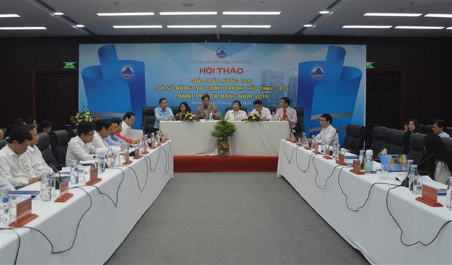 Quang cảnh hội thảo. (Ảnh: Đinh Văn Nhiều/TTXVN) Đà Nẵng tìm giải pháp nâng cao chỉ số năng lực cạnh tranh ảnh 1