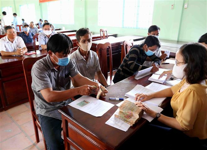 Thí điểm ký quỹ đối với người lao động đi làm việc tại Hàn Quốc ảnh 1