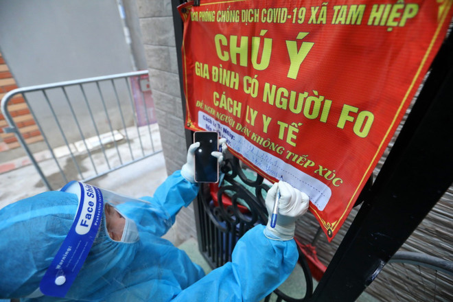 COVID-19: Số ca F0 tăng vọt, Hà Nội lập tổ hỗ trợ theo dõi F0 tại nhà ảnh 20
