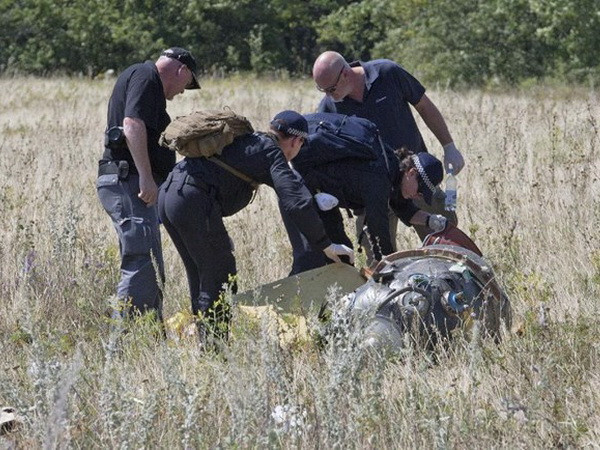 Thi thể 16 nạn nhân trong vụ MH17 sắp được đưa về Malaysia ảnh 1