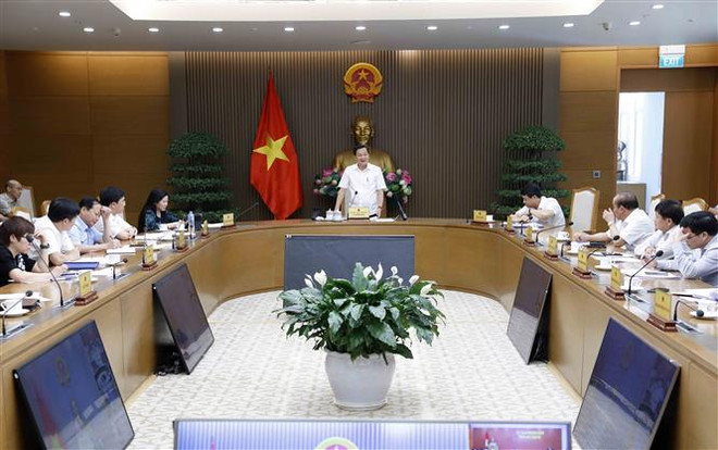 Quang cảnh cuộc họp. (Ảnh: An Đăng/TTXVN) Phó Thủ tướng Lê Minh Khái: Đẩy nhanh việc phân bổ vốn đầu tư công ảnh 2