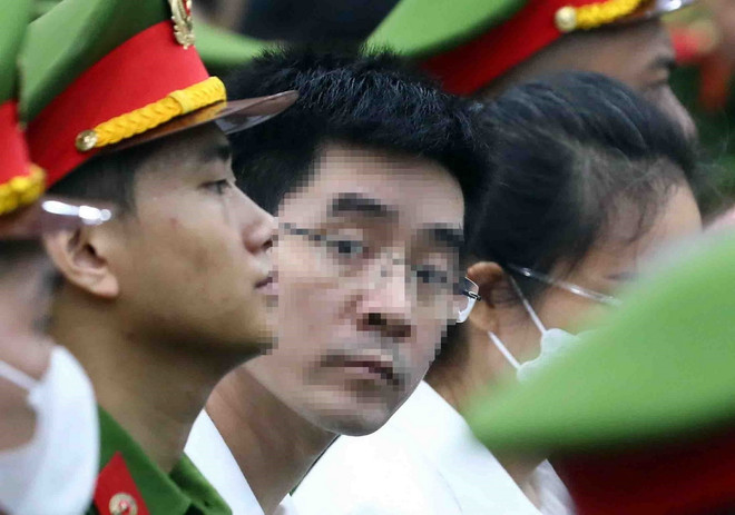 Bị cáo Hoàng Văn Hưng - cựu Trưởng Phòng 5, Cơ quan An ninh Điều tra, Bộ Công an nhận mức án tù chung thân. (Ảnh: Phạm Kiên/TTXVN) ttxvn-hoang-van-hung-4003.jpg