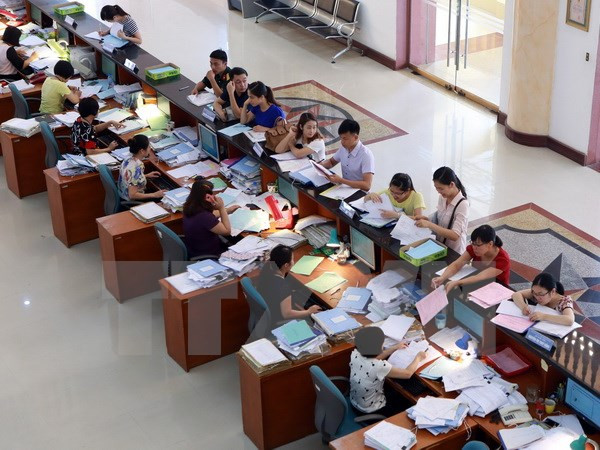 Ảnh minh họa. (Nguồn: TTXVN) Xử lý người đứng đầu nếu không đạt kế hoạch tinh giản biên chế ảnh 1