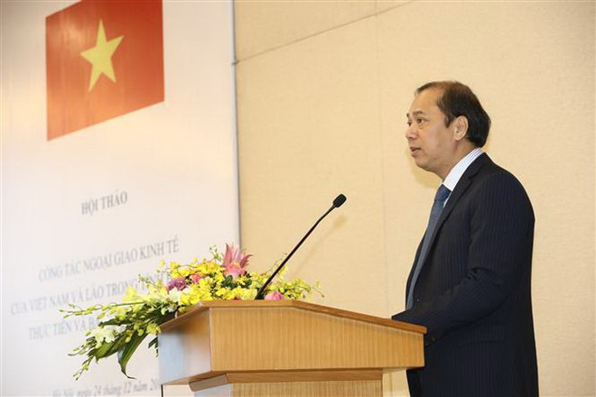 Việt Nam-Lào đẩy mạnh công tác ngoại giao kinh tế trong tình hình mới ảnh 2