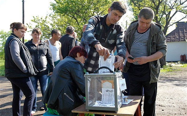 Ukraine tiến hành cuộc bầu cử địa phương theo luật mới ảnh 1