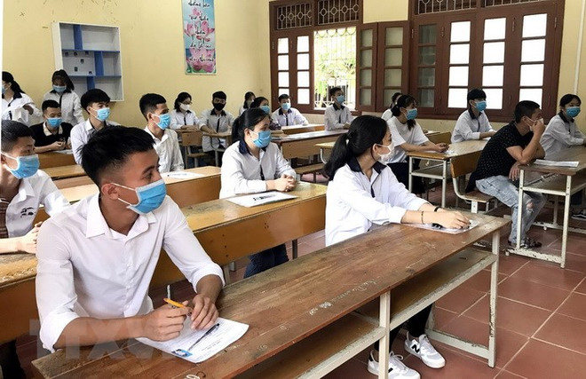 Thí sinh dự thi tốt nghiệp Trung học phổ thông năm 2020. (Ảnh: Quang Cường/TTXVN) Bình Thuận: Lần đầu tiên tổ chức thi tốt nghiệp THPT tại đảo Phú Quý ảnh 1