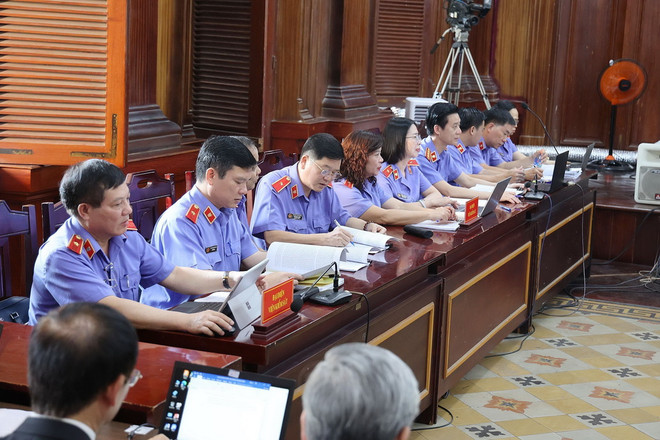 Đại diện Viện Kiểm Sát tại phiên tòa ngày 19/3. (Ảnh: Thanh Vũ/TTXVN) ttxvn_vu an van thinh phat.jpg