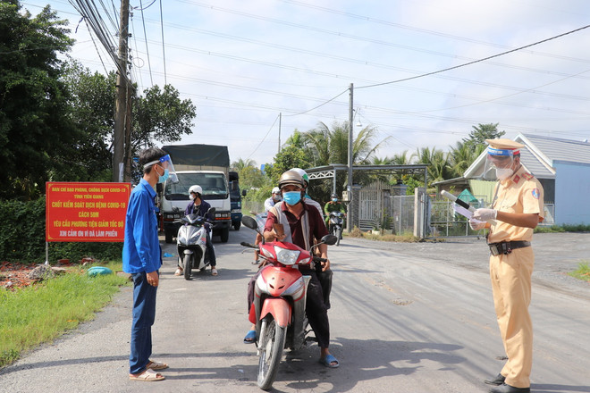 Quảng Ninh, Tiền Giang mở lại hoạt động ở một số địa phương ảnh 1