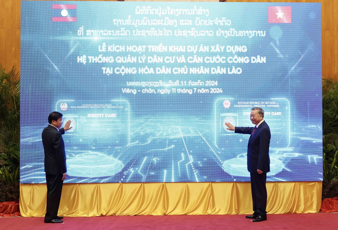 ttxvn_chu tich nuoc to lam tham lao 3.jpg