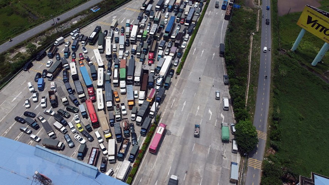 Giãn cách xã hội ở Hà Nội: Doanh nghiệp đang 'rối như tơ vò' ảnh 2