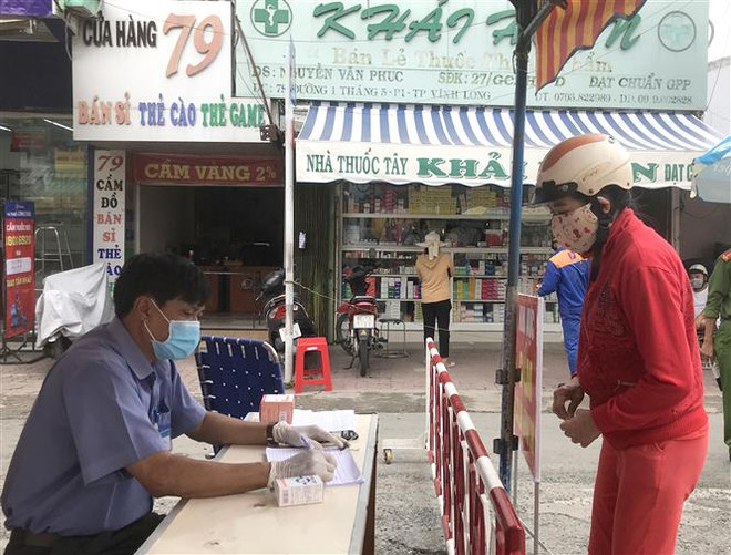 Sẻ chia yêu thương từ những 'gian hàng 0 đồng' ở Vĩnh Long ảnh 2