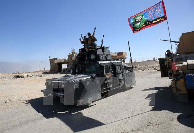 IOM cảnh báo IS sử dụng dân thường tại Mosul làm "lá chắn sống" ảnh 1