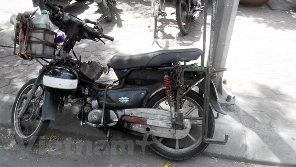 Ảnh minh họa. (Nguồn: Vietnam+) Hà Nội nghiên cứu thí điểm đo khí thải và hỗ trợ đổi xe máy cũ ảnh 1