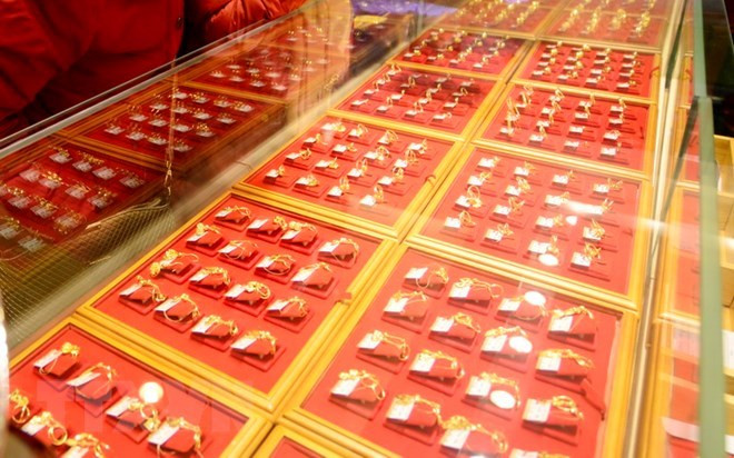 Giá vàng thế giới tăng lên, chạm mức đỉnh trong hơn một tuần ảnh 1