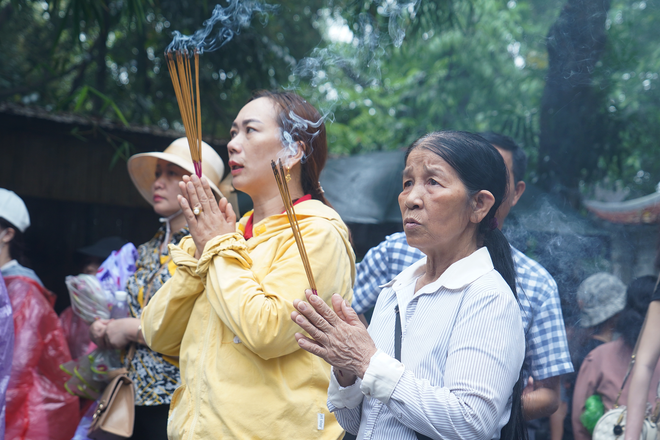 Với mỗi người dân Việt Nam, dù già hay trẻ, dù ở miền ngược hay miền xuôi, câu ca dao 'Dù ai đi ngược về xuôi, nhớ ngày Giỗ Tổ mùng 10/3' đã ăn sâu vào tiềm thức. (Ảnh: Việt Anh/Vietnam+) vnp_8.png