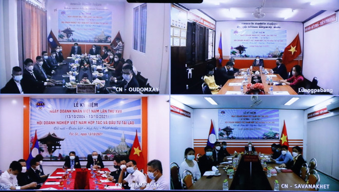 Quang cảnh lễ kỷ niệm tại 4 đầu cầu ở các tỉnh Luang Prabang, Savannakhet, Oudomsay và Champasak của Lào. (Ảnh: Phạm Kiên/Vietnam+) Doanh nghiệp Việt có nhiều đóng góp cho phát triển kinh tế-xã hội Lào ảnh 2