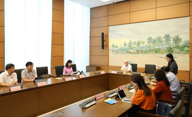 Đoàn đại biểu Quốc hội tỉnh: Lạng Sơn, Vĩnh Phúc, Bình Phước và thành phố Hải Phòng thảo luận ở tổ. (Ảnh: Văn Điệp/TTXVN) Đáp ứng yêu cầu quản lý, bảo vệ biên giới quốc gia trong tình hình mới ảnh 1