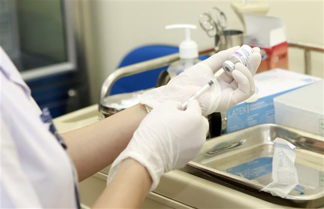 Tiêm vaccine ngừa COVID-19. (Nguồn: TTXVN) Đặt mục tiêu hoàn thành tiêm cho trẻ 5 đến dưới 12 tuổi trước tháng 9 ảnh 1