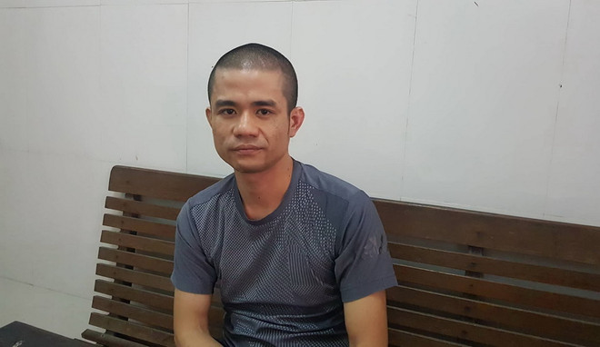 Thông tin chính thức về vụ bắt giữ kẻ mang lựu đạn cố thủ trong nhà ảnh 1