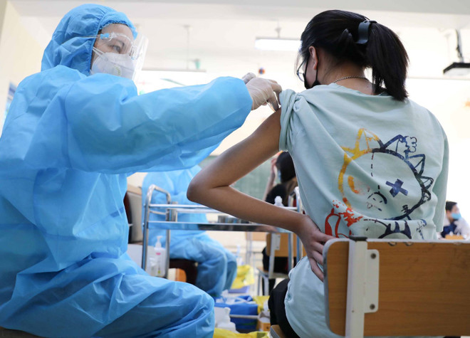 Việt Nam hướng đến mục tiêu sớm bao phủ vaccine phòng COVID-19 ảnh 1