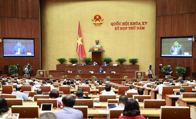 Bộ trưởng Bộ Kế hoạch và Đầu tư Nguyễn Chí Dũng giải trình, làm rõ một số vấn đề đại biểu Quốc hội nêu. (Ảnh: Doãn Tấn/TTXVN) Nội dung chính ngày làm việc thứ 4 Kỳ họp thứ 5, Quốc hội khóa XV ảnh 2