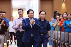 Thủ tướng Phạm Minh Chính đến dự và phát động thi đua chào mừng Đại hội XIV của Đảng. (Ảnh: Dương Giang/TTXVN)