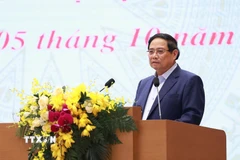 Thủ tướng Phạm Minh Chính phát động thi đua chào mừng Đại hội XIV của Đảng. (Ảnh: Dương Giang/TTXVN)