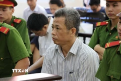 Ông Nguyễn Hồng Khanh, nguyên Bí thư Thị xã Bến Cát tại phiên xét xử ngày 19/12/2019. )Ảnh: Nguyễn Văn Việt/TTXVN)