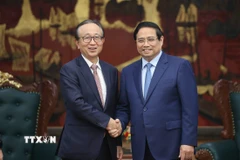 Thủ tướng Phạm Minh Chính tiếp ông Hironori Kamezawa, Tổng giám đốc Tập đoàn MUFG, Nhật Bản. (Ảnh: Dương Giang/TTXVN)