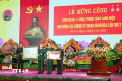 Binh đoàn 15 đón nhận danh hiệu Anh hùng Lực lượng vũ trang nhân dân lần thứ 2. (Ảnh: Hồng Điệp/TTXVN)