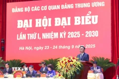 Ông Trần Cẩm Tú, Ủy viên Bộ Chính trị, Thường trực Ban Bí thư, Bí thư Đảng ủy các cơ quan Đảng Trung ương phát biểu khai mạc Đại hội. (Ảnh: Phương Hoa/TTXVN)