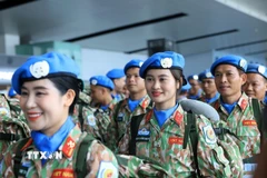 Niềm vui và tự hào của chiến sỹ Đội Công binh số 4 khi lên đường thực hiện nhiệm vụ gìn giữ hòa bình. (Ảnh: Tuấn Anh/TTXVN)