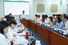 Phiên họp thứ nhất, Ủy ban Bầu cử Thành phố Hồ Chí Minh. (Ảnh: Hữu Duyên/TTXVN)