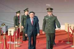 Thường trực Ban Bí thư Trần Cẩm Tú dự Lễ xuất quân, diễn tập phương án bảo đảm an ninh, trật tự Đại hội đại biểu toàn quốc lần thứ XIV của Đảng. (Ảnh: Phương Hoa/TTXVN)