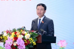 Đồng chí Nguyễn Mạnh Hùng, Ủy viên Trung ương Đảng, Bộ trưởng Bộ Khoa học và Công nghệ trả lời câu hỏi của phóng viên các cơ quan thông tấn, báo chí. (Ảnh: Phạm Kiên/TTXVN)