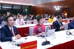 Các đại biểu tham dự buổi họp báo. (Ảnh: Phạm Kiên/TTXVN)