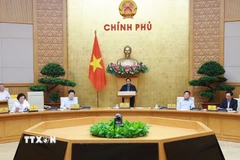 Thủ tướng Phạm Minh Chính chủ trì họp Chính phủ để đánh giá việc vận hành mô hình chính quyền địa phương 2 cấp.(Ảnh: Dương Giang/TTXVN)