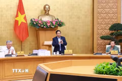 Thủ tướng Phạm Minh Chính chủ trì cuộc họp Chính phủ chuyên đề về việc sắp xếp, tổ chức lại đơn vị hành chính các cấp. (Ảnh: Dương Giang/TTXVN)