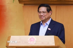 Thủ tướng Phạm Minh Chính chủ trì cuộc họp Chính phủ chuyên đề về việc sắp xếp, tổ chức lại đơn vị hành chính các cấp. (Ảnh: Dương Giang/TTXVN)